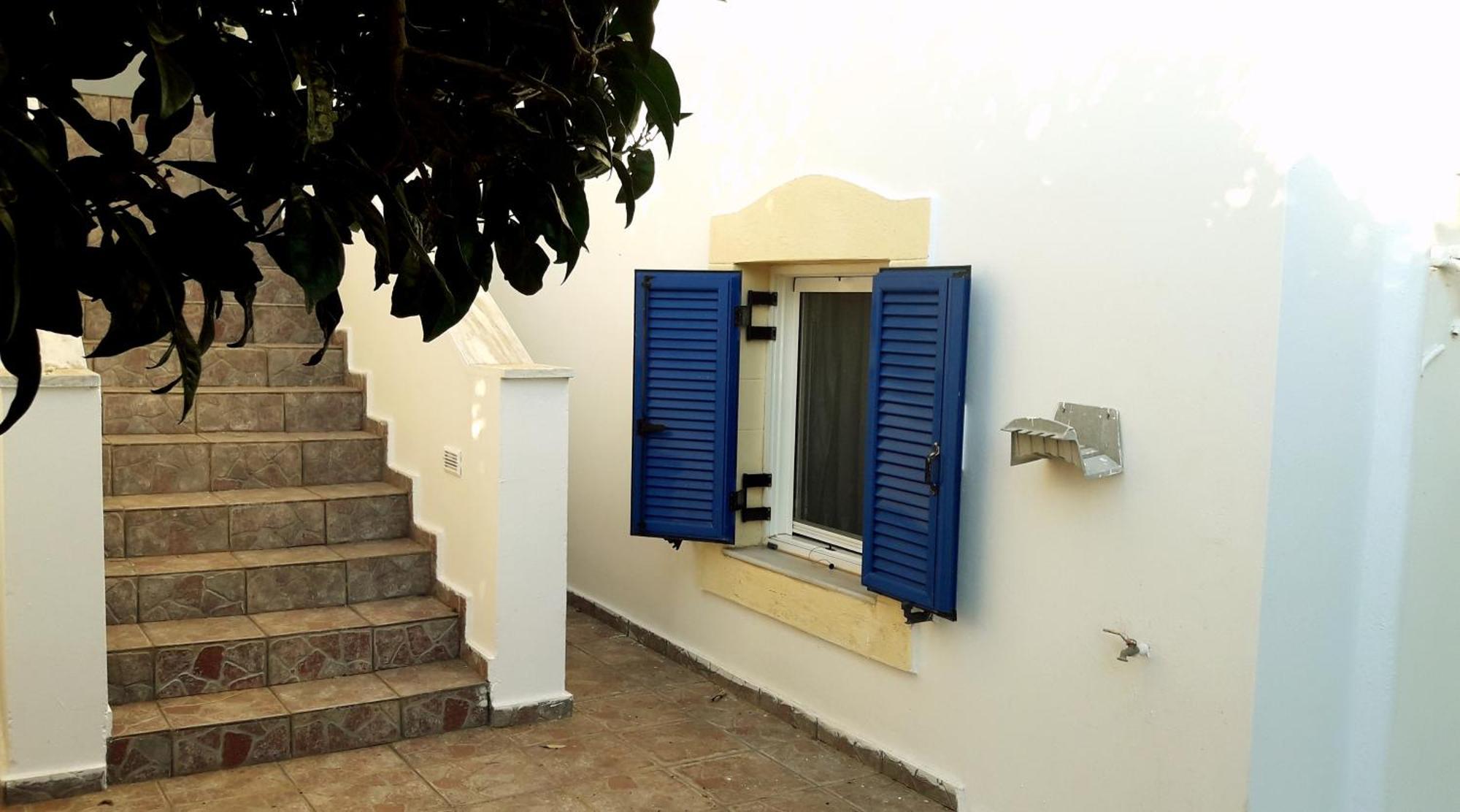 Theofilos Appartements Livadi  Rom bilde